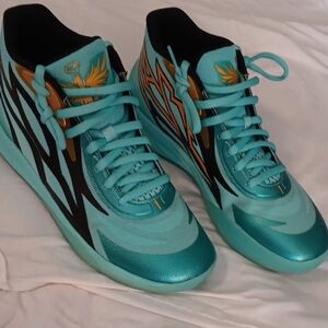 Puma MELO Teal and Black Basketball Shoes with Gold Accents